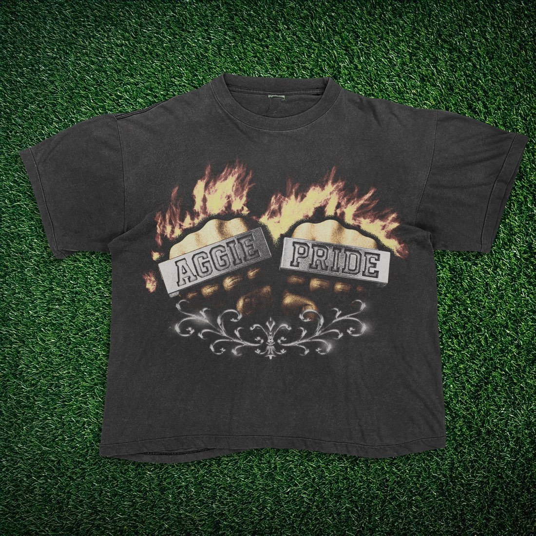 White tee with an Aggie Fists graphic