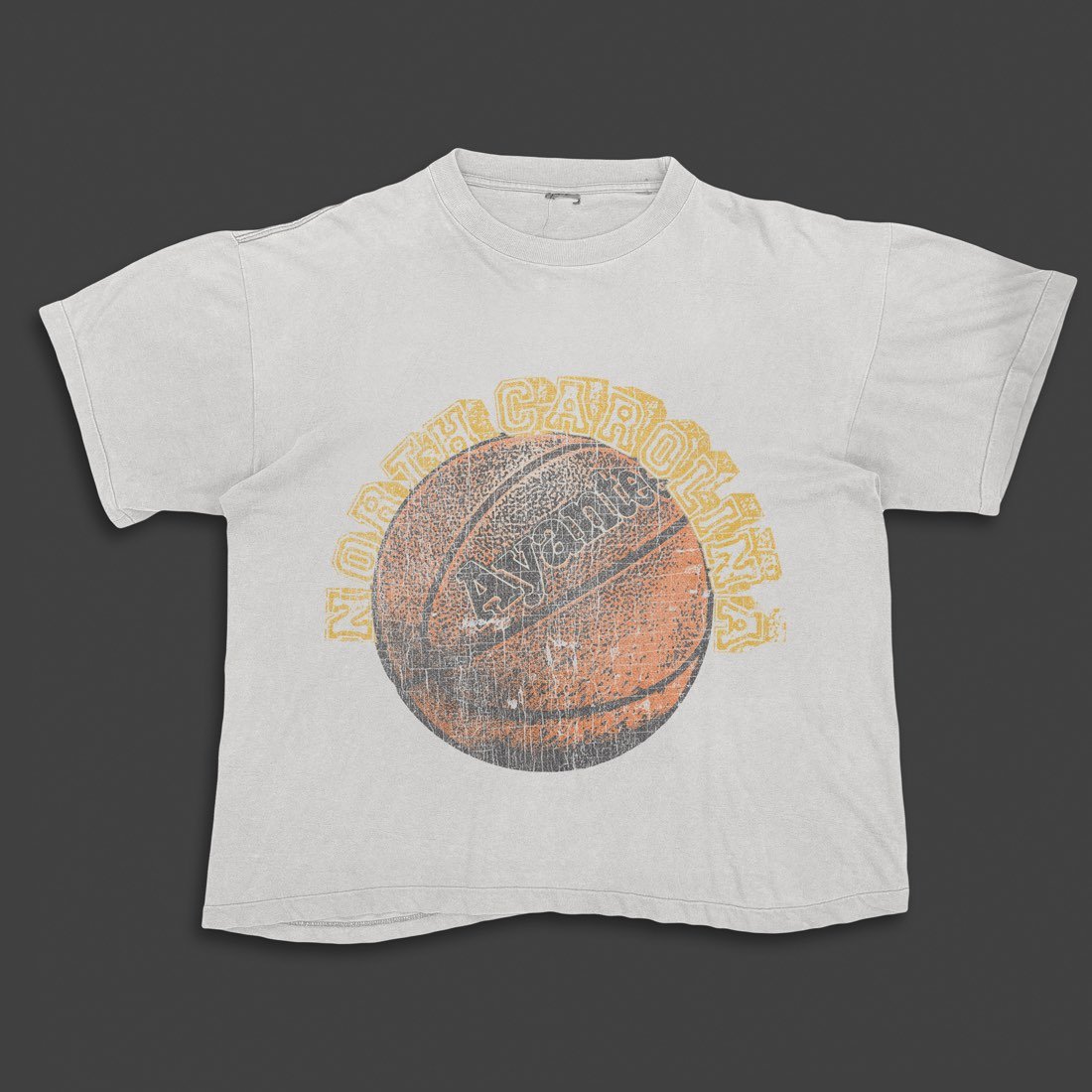 White tee with a basketball Ag graphic